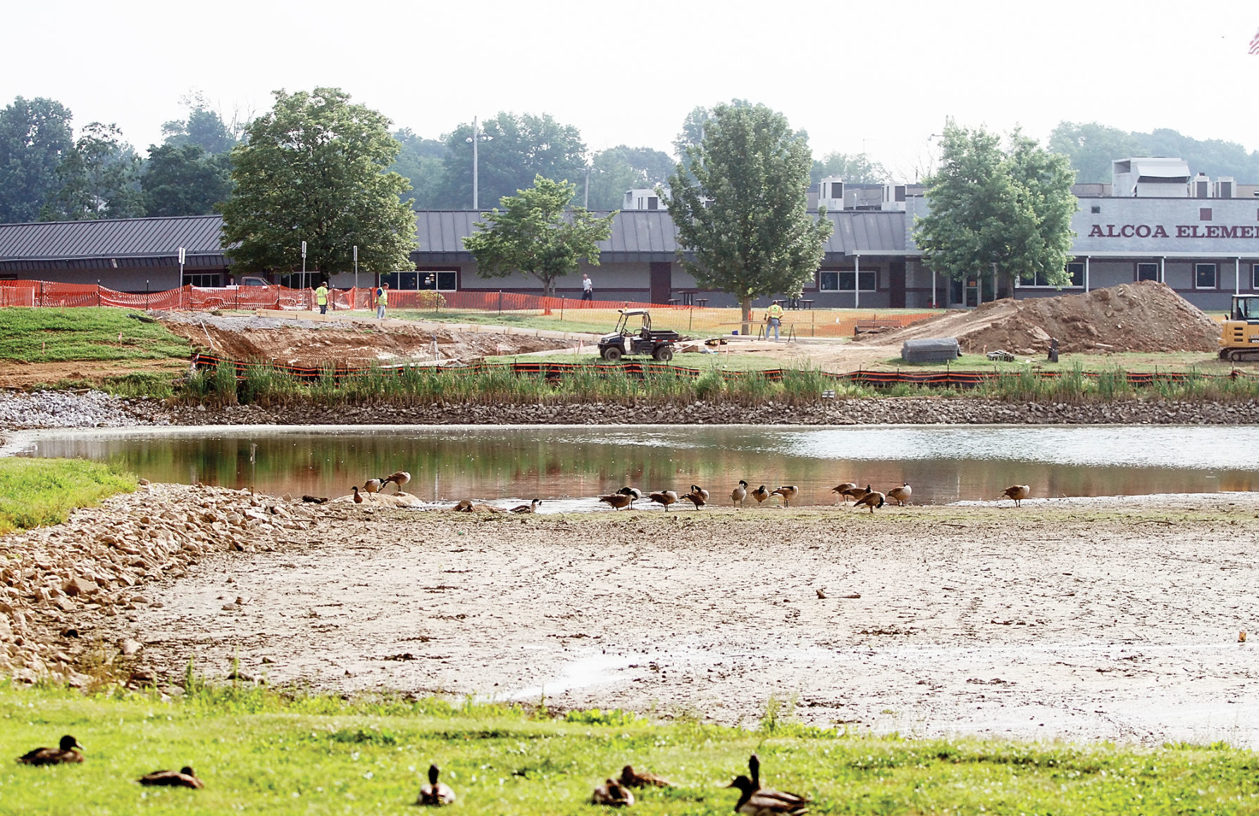 Work has begun on repairing the Alcoa Duck Pond